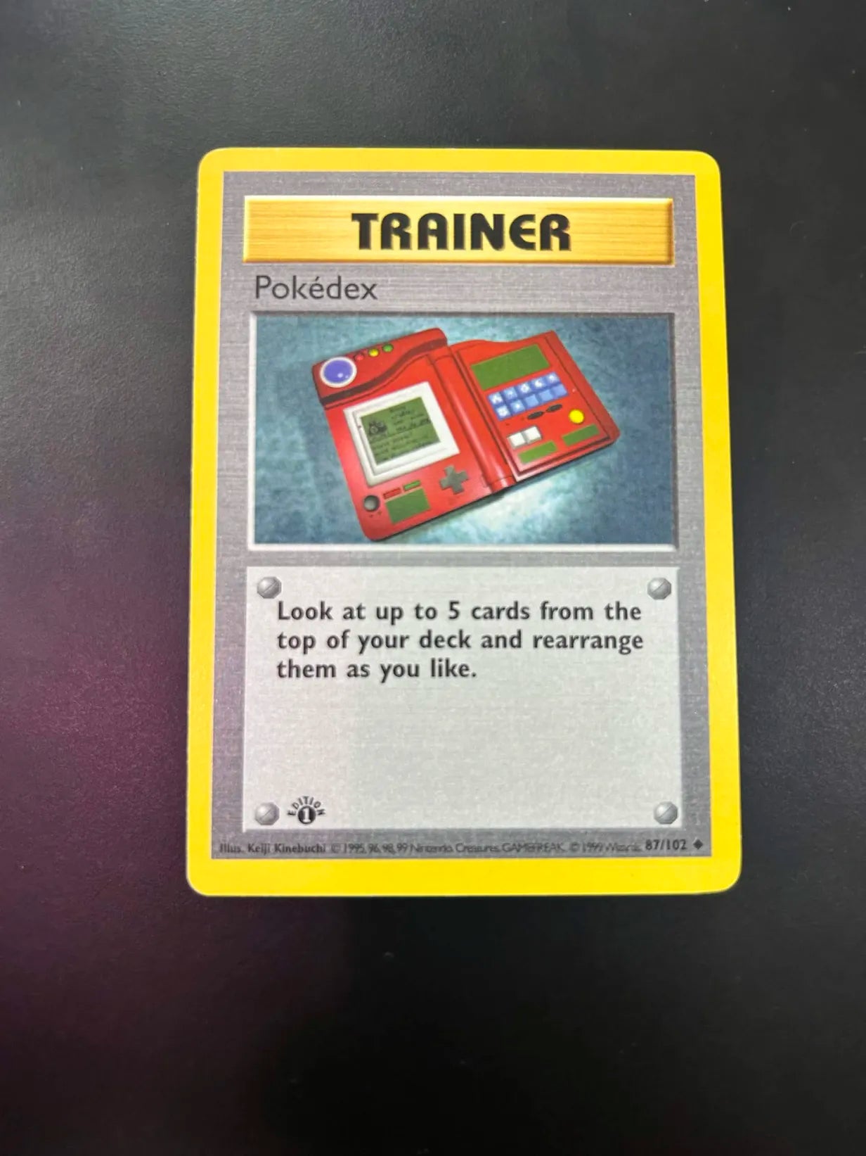 #87 1st Edition Pokemon Base Set-PokeDex non-holo(DMG)